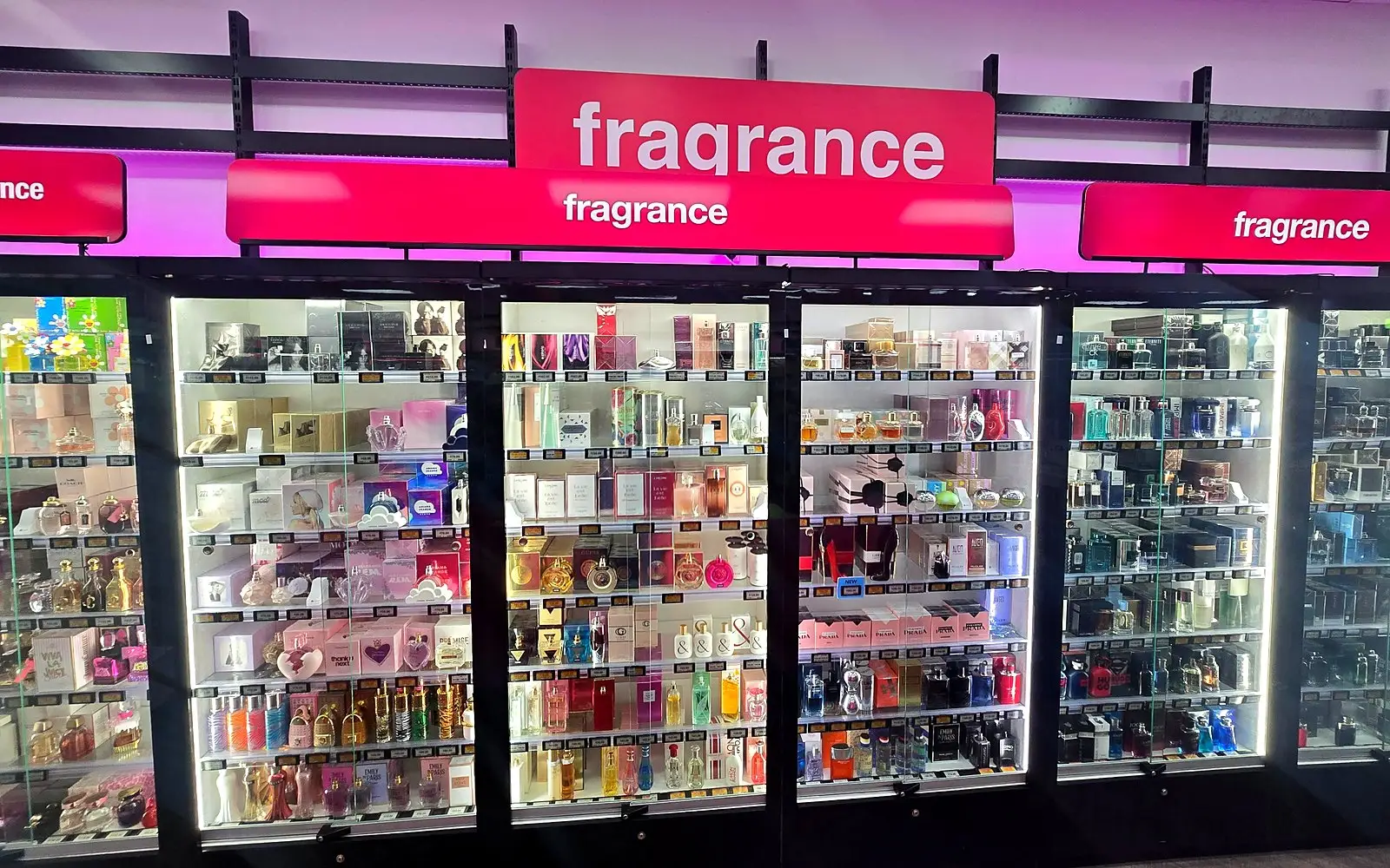 Lit fragrance cabinets at Priceline Pharmacy Pacific Fair